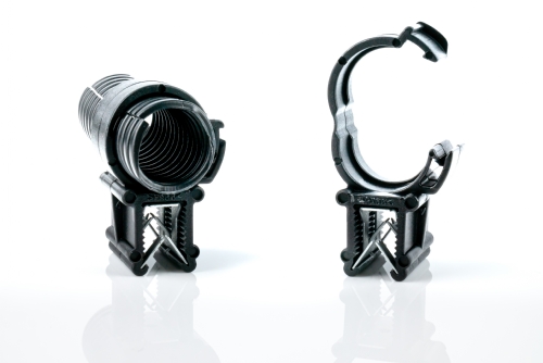 Edge clips for corrugated tubing